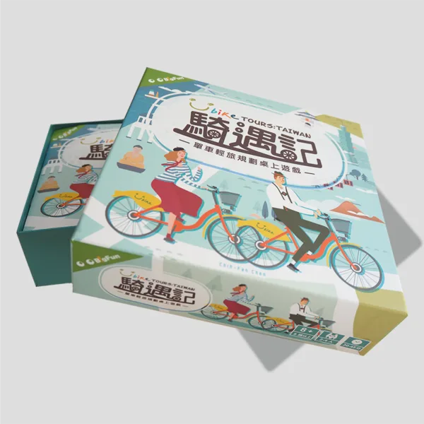 Open box of UBike Tours: Taiwan showing travel cards, player boards, and tokens, ready for players to begin their biking adventure across Taiwan.