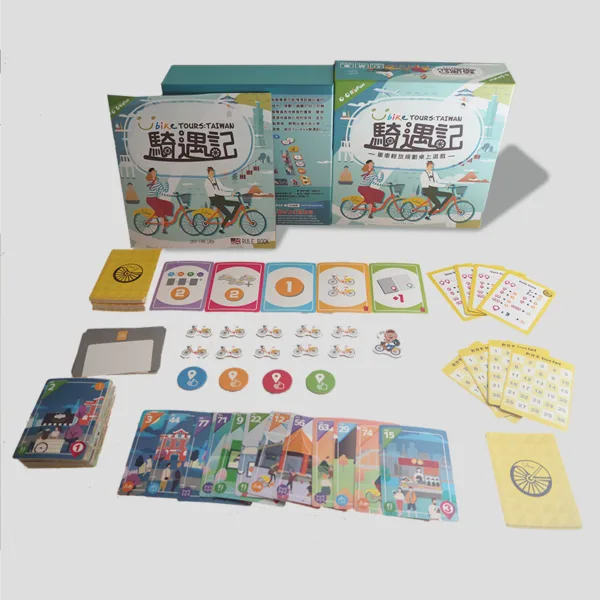 All materials from UBike Tours: Taiwan laid out, including travel cards, tokens, and player boards, set against a colorful background of Taiwan’s scenic spots.