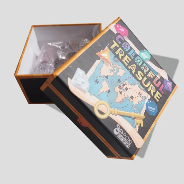 Open box of Colorful Treasure displaying colorful cards, special ability tokens, and game components, ready for a gem-hunting adventure.