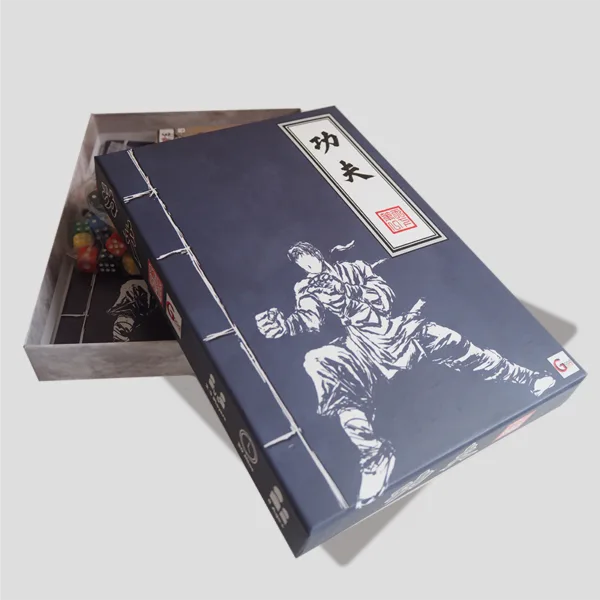 Open box of Kung Fu showing Kung Fu cards, dice, and player tokens, ready for players to compete for the title of Kung Fu Master.